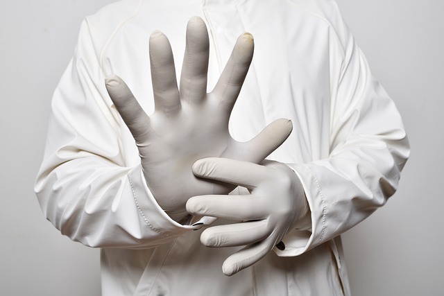 a person wears protective gloves