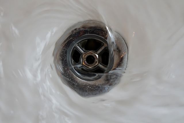 photo of water going down the drain