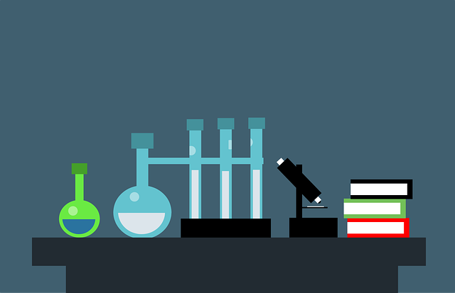 illustration of books and lab equipment aligned on table